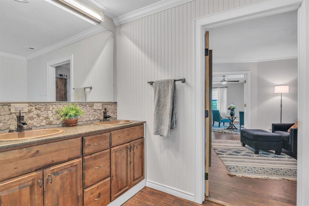 860 County Road 1627 Rusk, TX 75785 - Photo 15 of 37 a bathroom with a sink and a mirror
