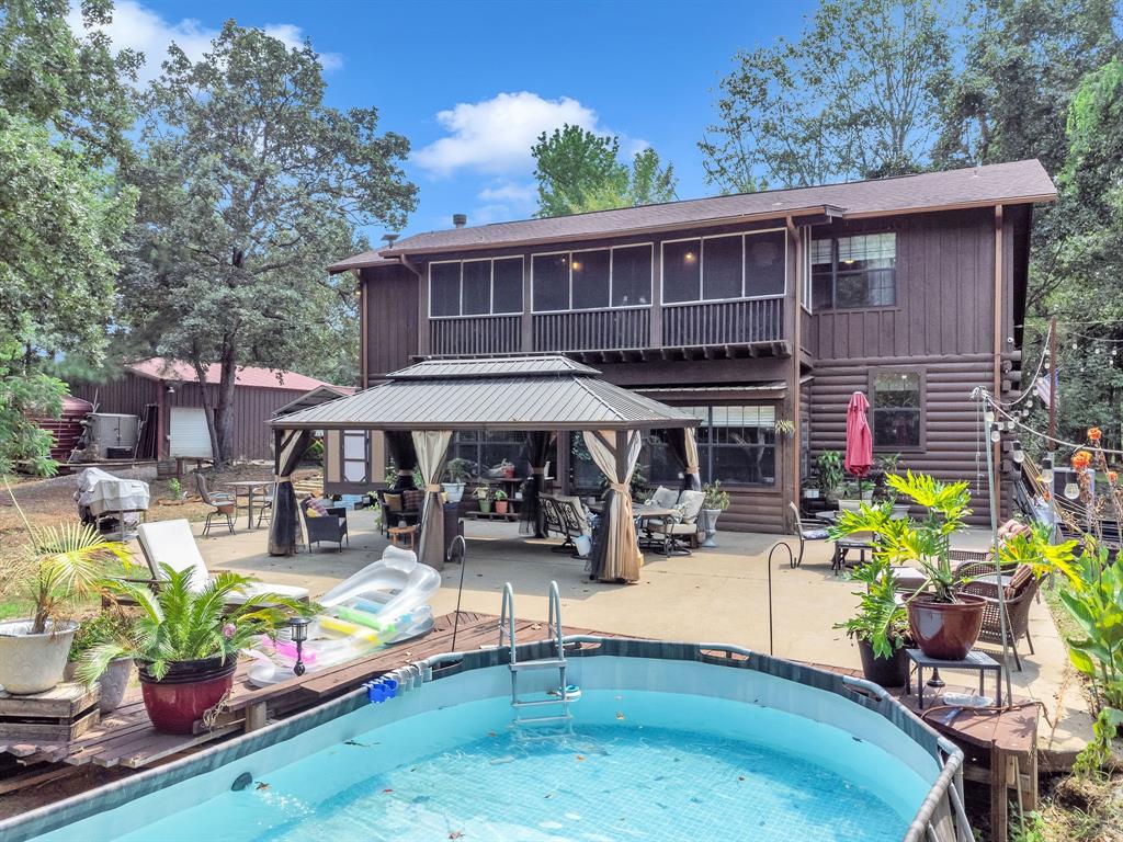 860 County Road 1627 Rusk, TX 75785 - Photo 19 of 37 a view of a lounge chairs in patio