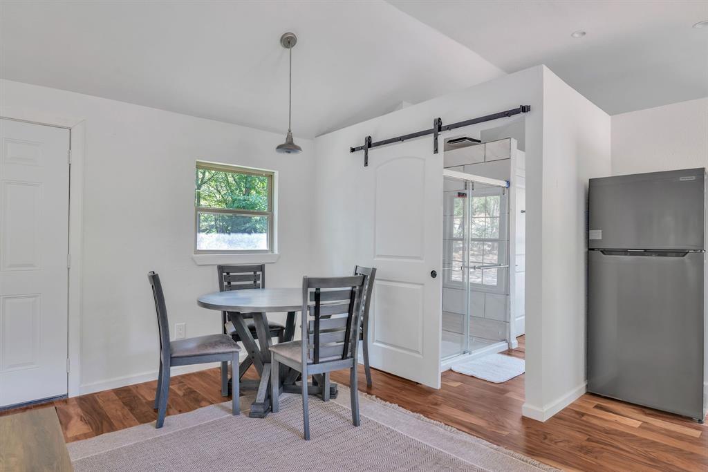 860 County Road 1627 Rusk, TX 75785 - Photo 23 of 37 a view of a dining room with furniture and a window