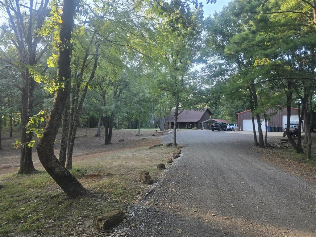 860 County Road 1627 Rusk, TX 75785 - Photo 28 of 37 a view of a tree in front of a house