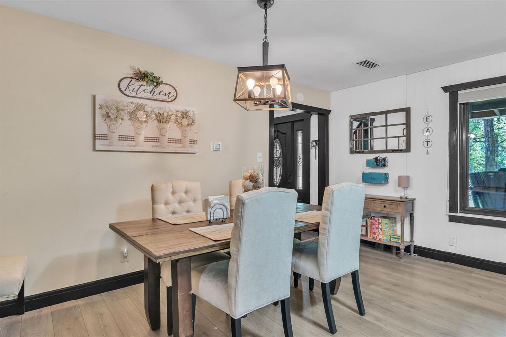 860 County Road 1627 Rusk, TX 75785 - Photo 8 of 37 a view of a dining room with furniture window and wooden floor