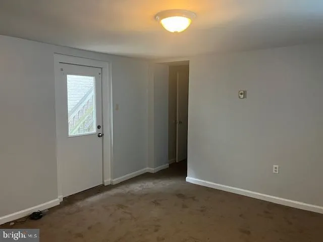 an empty room with a window