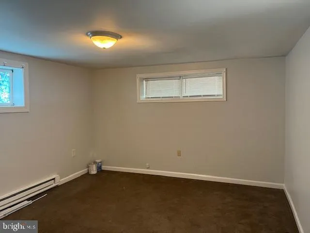 a kitchen with a stove and a sink