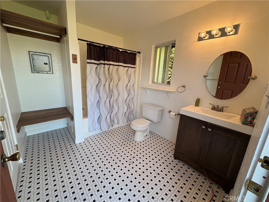 1721 East Ruddock Street Covina, CA 91724 - Photo 13 of 29 a bathroom with a sink a toilet and shower