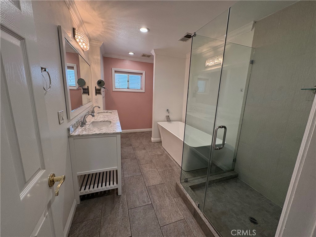 1721 East Ruddock Street Covina, CA 91724 - Photo 17 of 29 a bathroom with sink and mirror