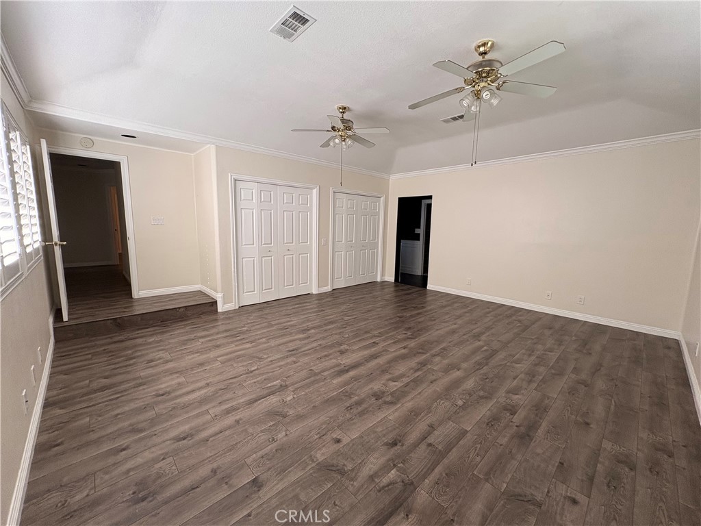 1721 East Ruddock Street Covina, CA 91724 - Photo 23 of 29 wooden floor in an empty room with a window
