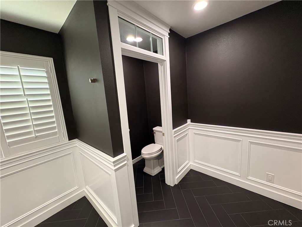 1721 East Ruddock Street Covina, CA 91724 - Photo 27 of 29 a bathroom with a toilet and a sink