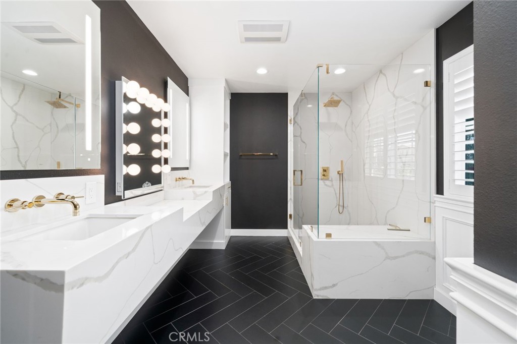 1721 East Ruddock Street Covina, CA 91724 - Photo 27 of 39 a bathroom with a bathtub a sink and a shower