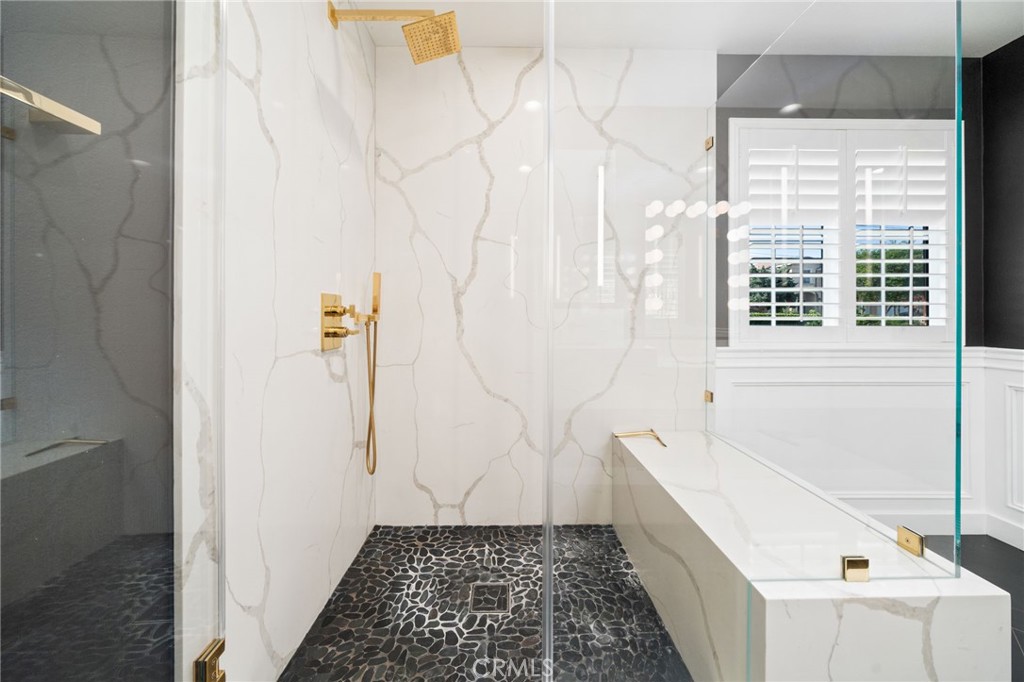 1721 East Ruddock Street Covina, CA 91724 - Photo 28 of 39 a bathroom with a bathtub and a shower