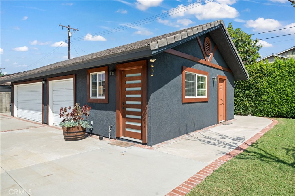 1721 East Ruddock Street Covina, CA 91724 - Photo 29 of 39 a front view of a house with a porch