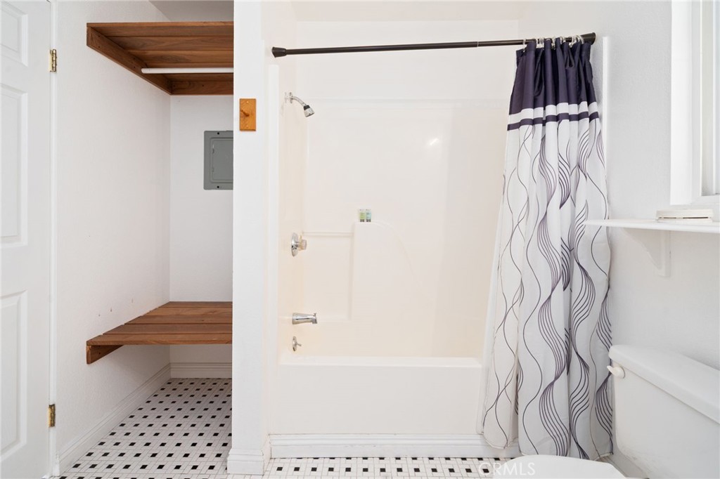 1721 East Ruddock Street Covina, CA 91724 - Photo 33 of 39 a bathroom with a bathtub and a shower