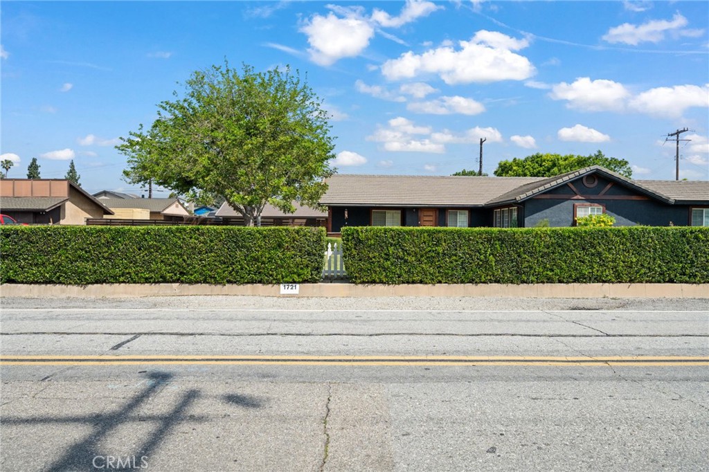 1721 East Ruddock Street Covina, CA 91724 - Photo 4 of 39 a view of a house with a yard