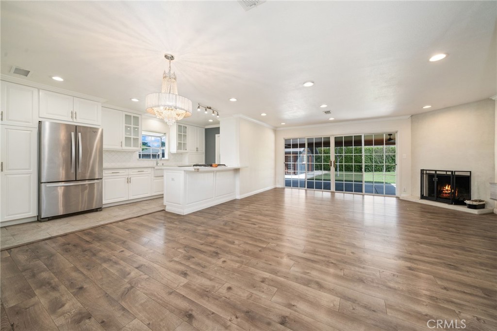 1721 East Ruddock Street Covina, CA 91724 - Photo 5 of 39 a view of a kitchen with a sink and a stove top oven