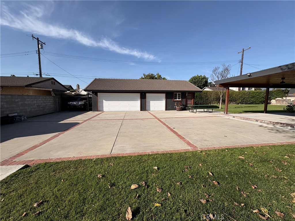 1721 East Ruddock Street Covina, CA 91724 - Photo 6 of 29 a front view of a house with a yard