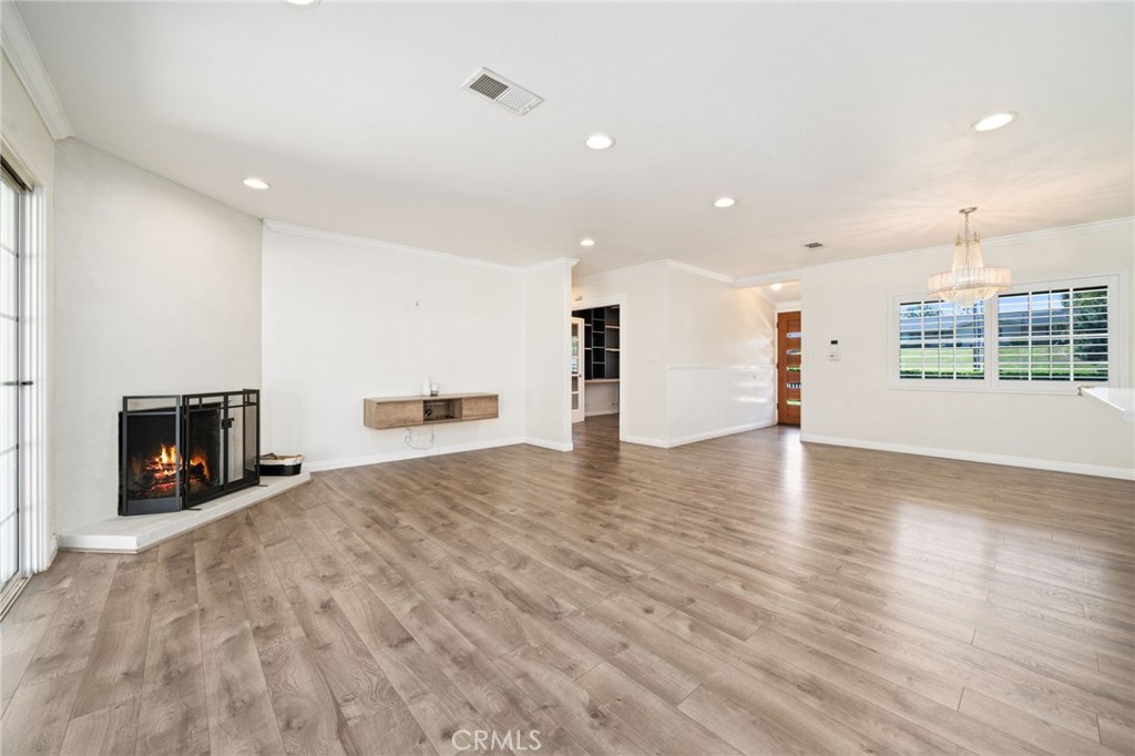 1721 East Ruddock Street Covina, CA 91724 - Photo 7 of 39 a view of a kitchen with a sink and a fireplace