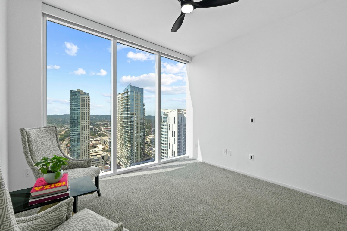 301 West Avenue, Unit 2708 Austin, TX 78701 - Photo 15 of 27 a living room with furniture and a window