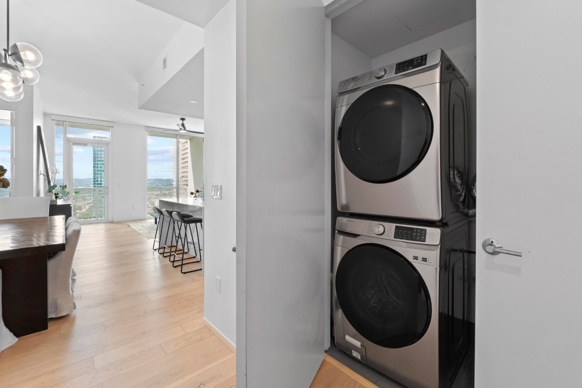 301 West Avenue, Unit 2708 Austin, TX 78701 - Photo 19 of 27 a view of a hallway with washer and dryer