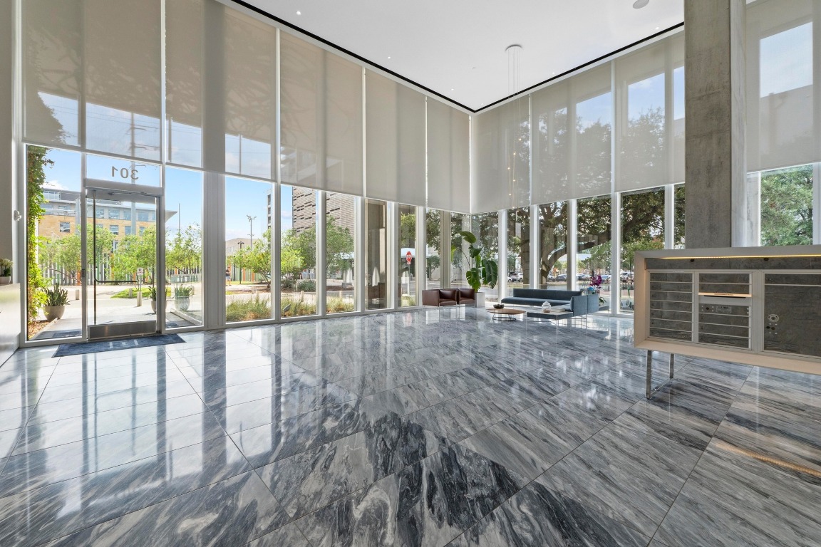 301 West Avenue, Unit 2708 Austin, TX 78701 - Photo 21 of 27 a view of an empty room with wooden floor and a window