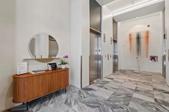 a view of a chairs and table in a patio