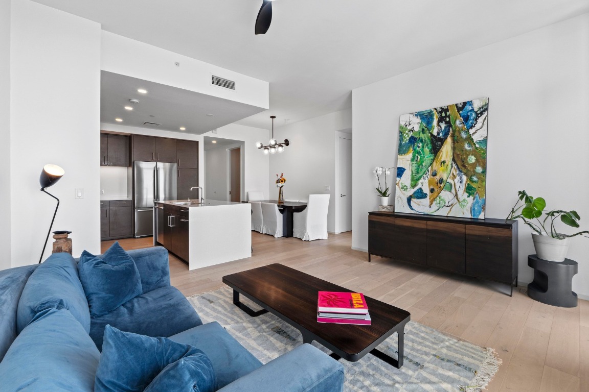 301 West Avenue, Unit 2708 Austin, TX 78701 - Photo 6 of 27 a living room with furniture and kitchen view