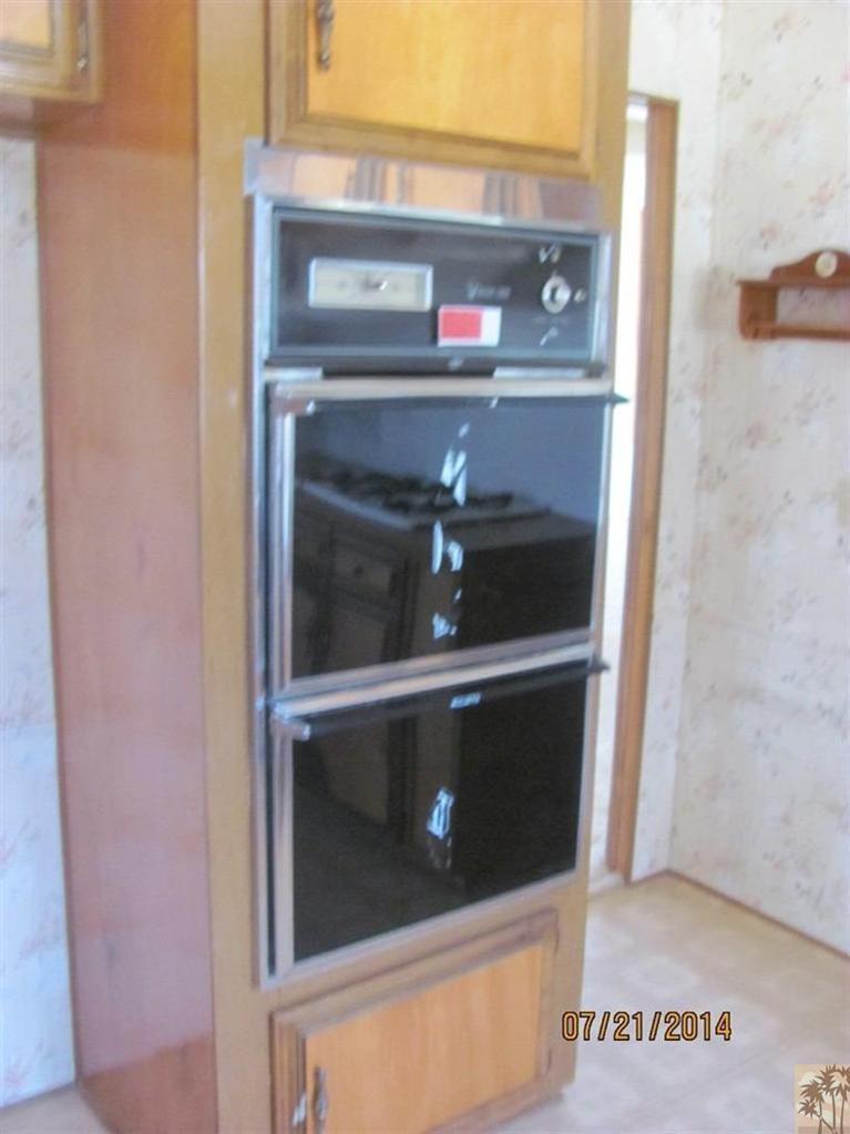 7180 Saddleback Road Joshua Tree, CA 92252 - Photo 12 of 20 a close view of washer and dryer