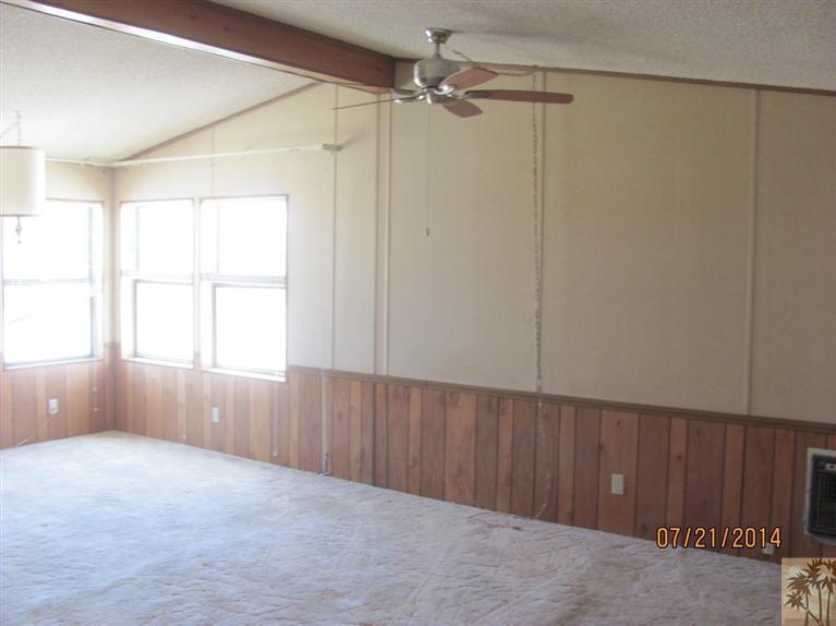 7180 Saddleback Road Joshua Tree, CA 92252 - Photo 14 of 20 a view of an empty room with a window