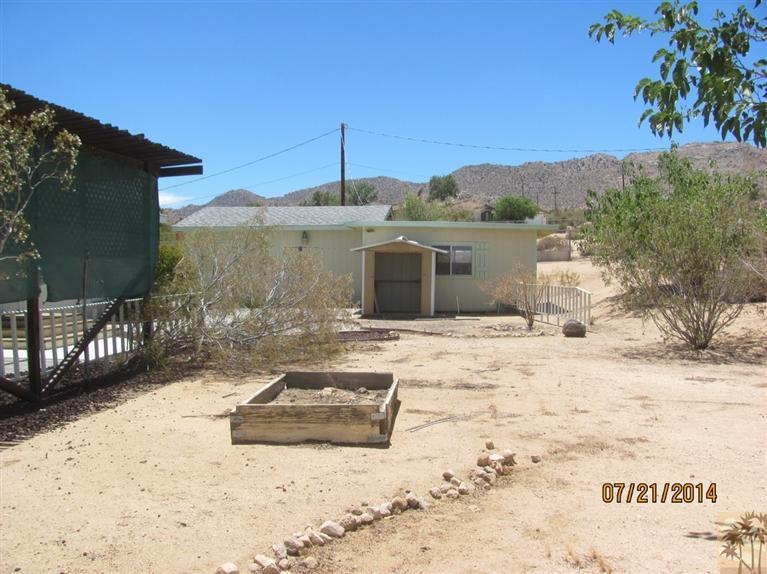 7180 Saddleback Road Joshua Tree, CA 92252 - Photo 18 of 20 a view of a terrace with a snow
