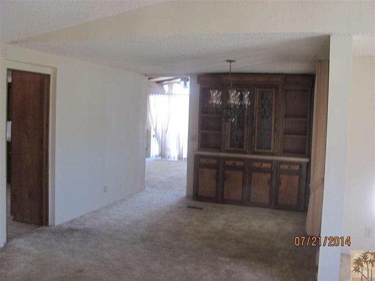 7180 Saddleback Road Joshua Tree, CA 92252 - Photo 7 of 20 a view of an empty room with a window