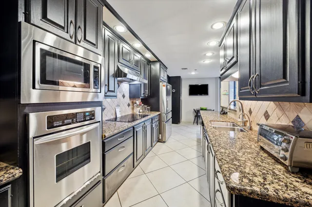 $345,000 | 3350 McCue Road, Unit 1504, Houston, TX 77056