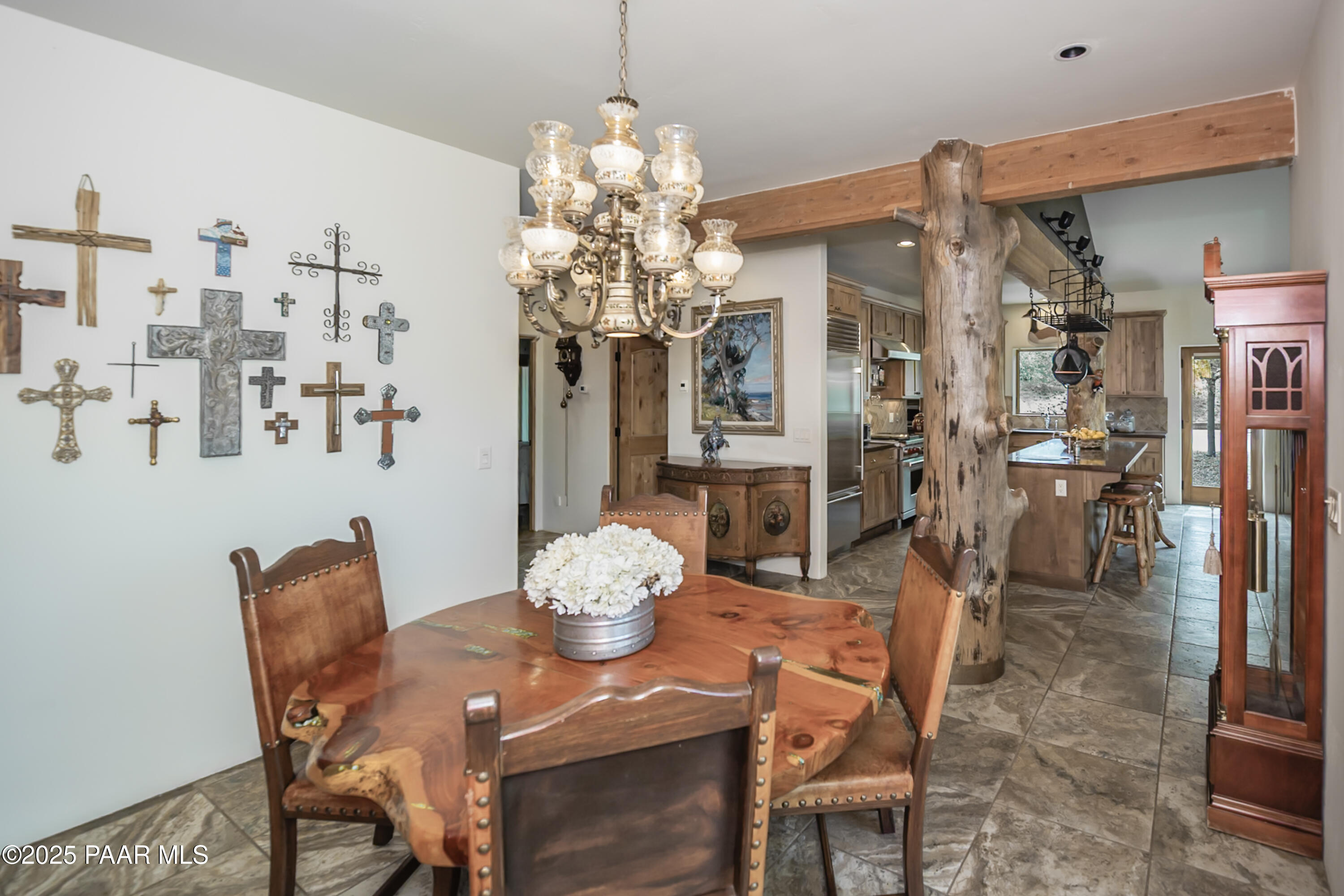 770 Grisby Road Skull Valley, AZ 86338 - Photo 12 of 58 a view of a dining room with furniture and chandelier