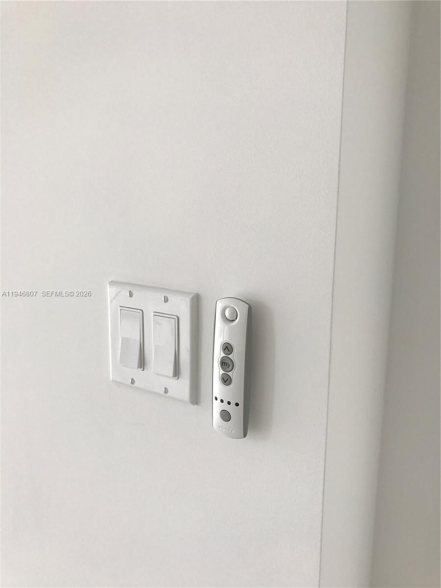 68 Southeast 6th Street, Unit 2504 Miami, FL 33131 - Photo 27 of 47 a view of a livingroom with wooden floor