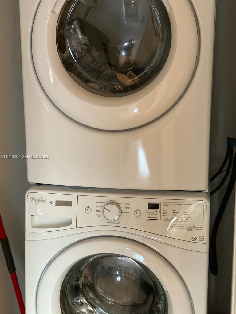 68 Southeast 6th Street, Unit 2504 Miami, FL 33131 - Photo 28 of 47 a close up view of washer and dryer