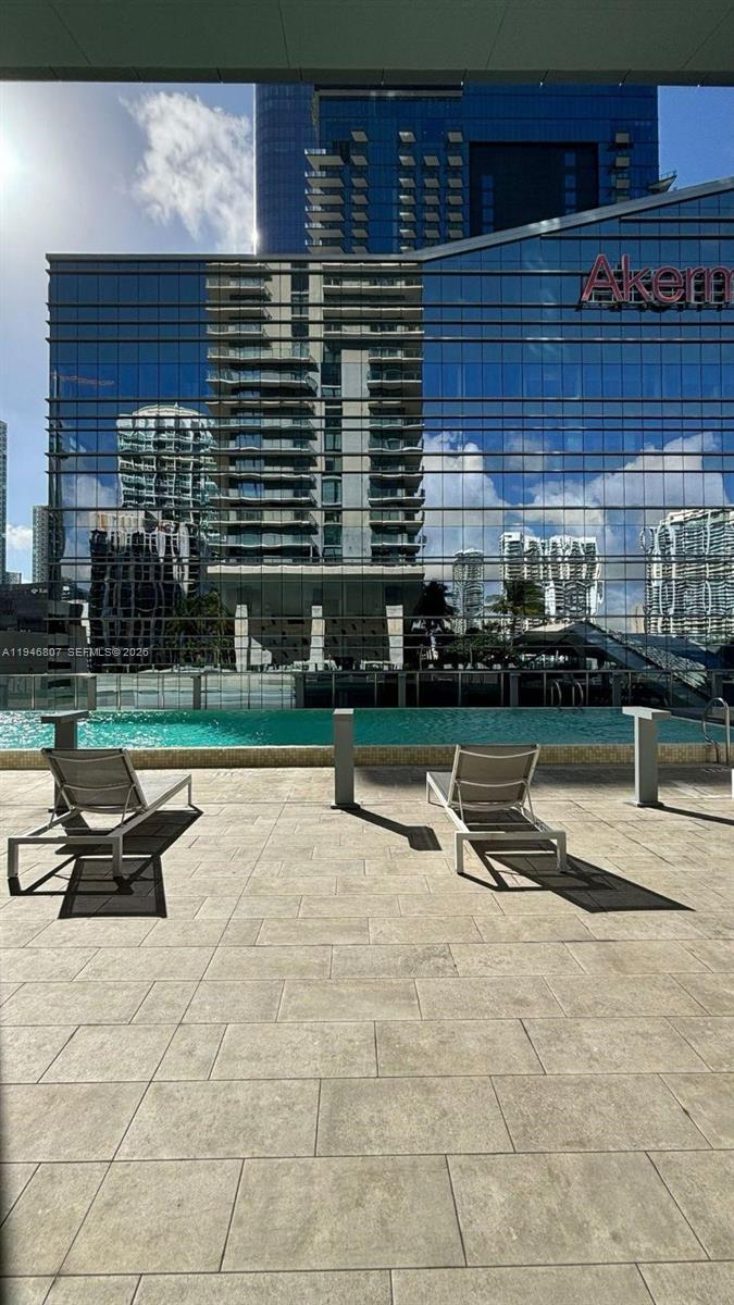 68 Southeast 6th Street, Unit 2504 Miami, FL 33131 - Photo 30 of 47 a view of outdoor space with seating