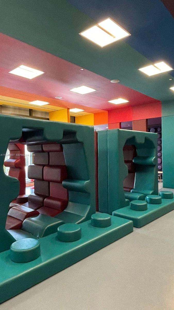 68 Southeast 6th Street, Unit 2504 Miami, FL 33131 - Photo 37 of 47 a view of a two chairs in front of the house