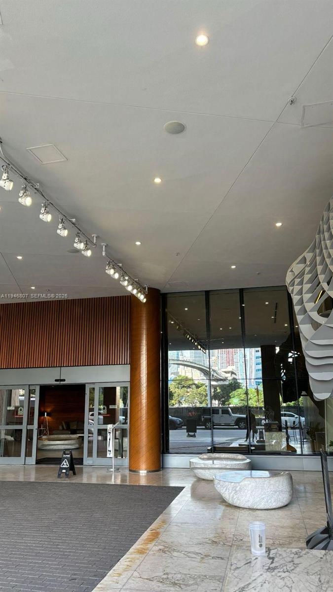 68 Southeast 6th Street, Unit 2504 Miami, FL 33131 - Photo 47 of 47 a view of a hall with the living space