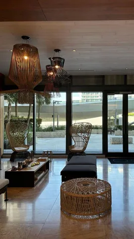 a view of a hall with the bricks wall and laminate floor