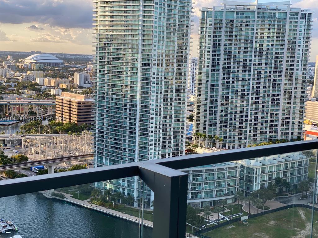 68 Southeast 6th Street, Unit 2504 Miami, FL 33131 - Photo 8 of 47 a view of a balcony with city view