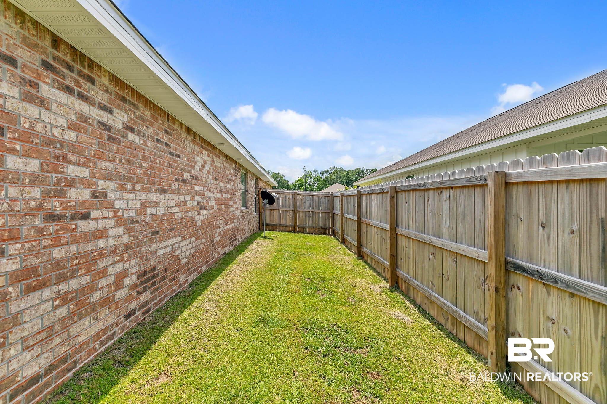 17217 REFLECTION Street Loxley, AL 36551 - Photo 45 of 83 View of fenced backyard