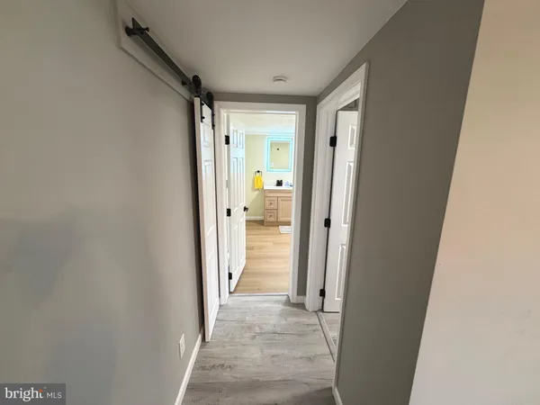 a kitchen with a sink cabinets and appliances