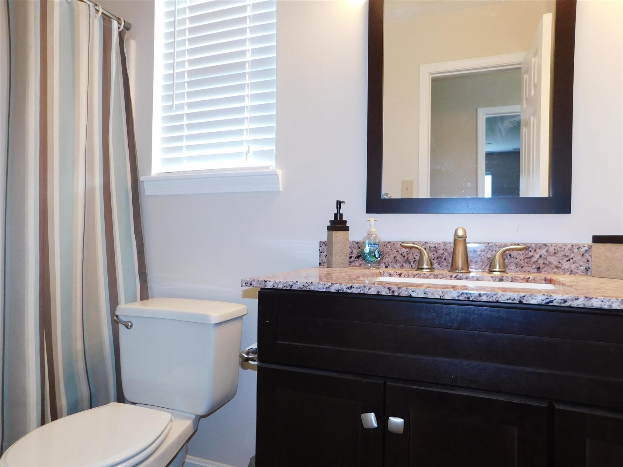 293 Bumpus Mill Road Oak Grove, KY 42262 - Photo 9 of 9 Full Bathroom Downstairs with upgraded sink!