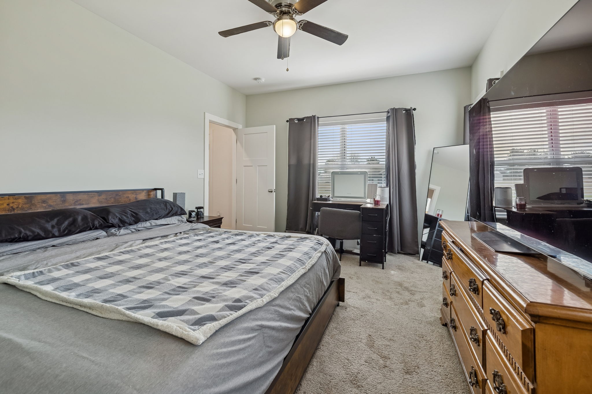 137 Mt Vernon Church Road Bethpage, TN 37022 - Photo 29 of 44 a bedroom with a bed and a flat screen tv