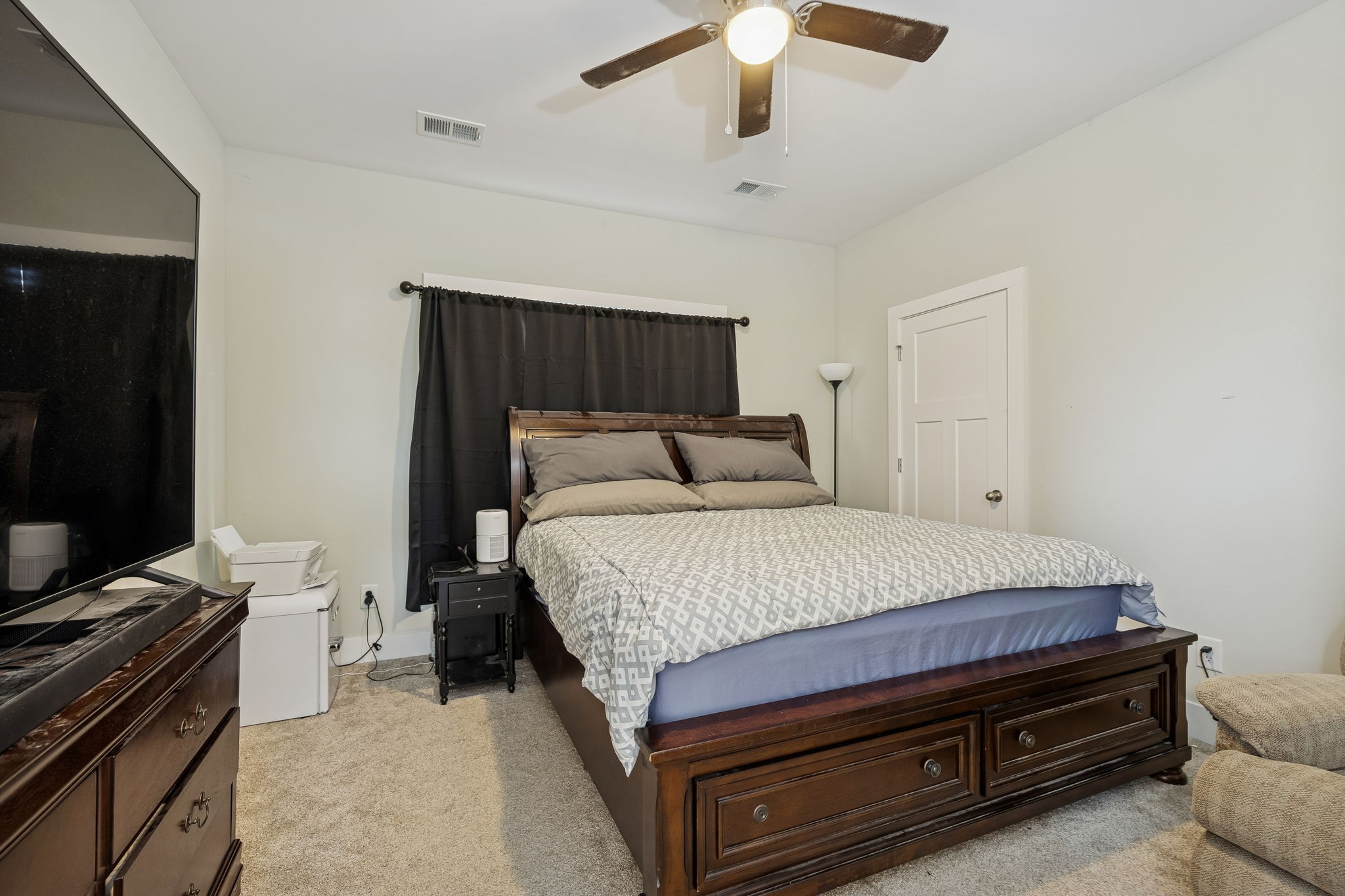 137 Mt Vernon Church Road Bethpage, TN 37022 - Photo 36 of 44 a bedroom with a bed and a flat screen tv