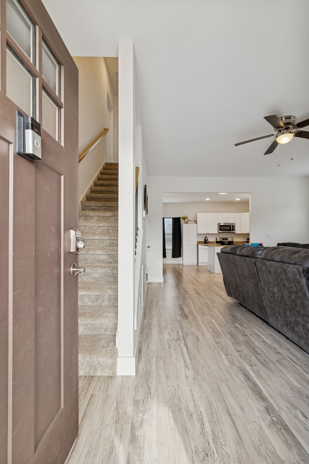 137 Mt Vernon Church Road Bethpage, TN 37022 - Photo 7 of 44 a view of kitchen and hallway with wooden floor