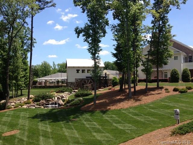 6015 Fallondale Road Waxhaw, NC 28173 - Photo 3 of 7 a view of a garden with a fountain