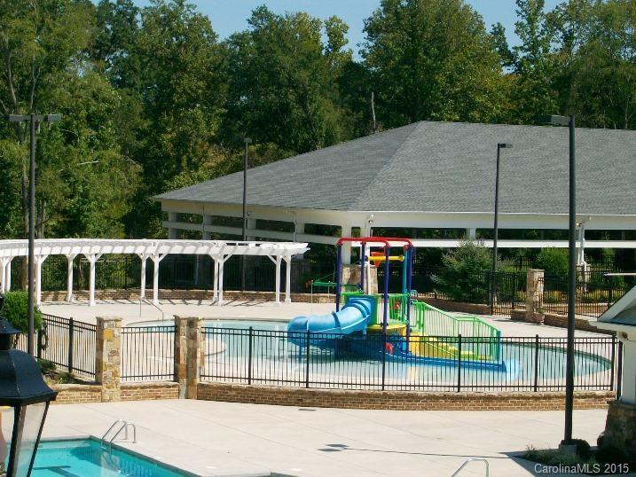 6015 Fallondale Road Waxhaw, NC 28173 - Photo 7 of 7 a view of a swimming pool with a patio