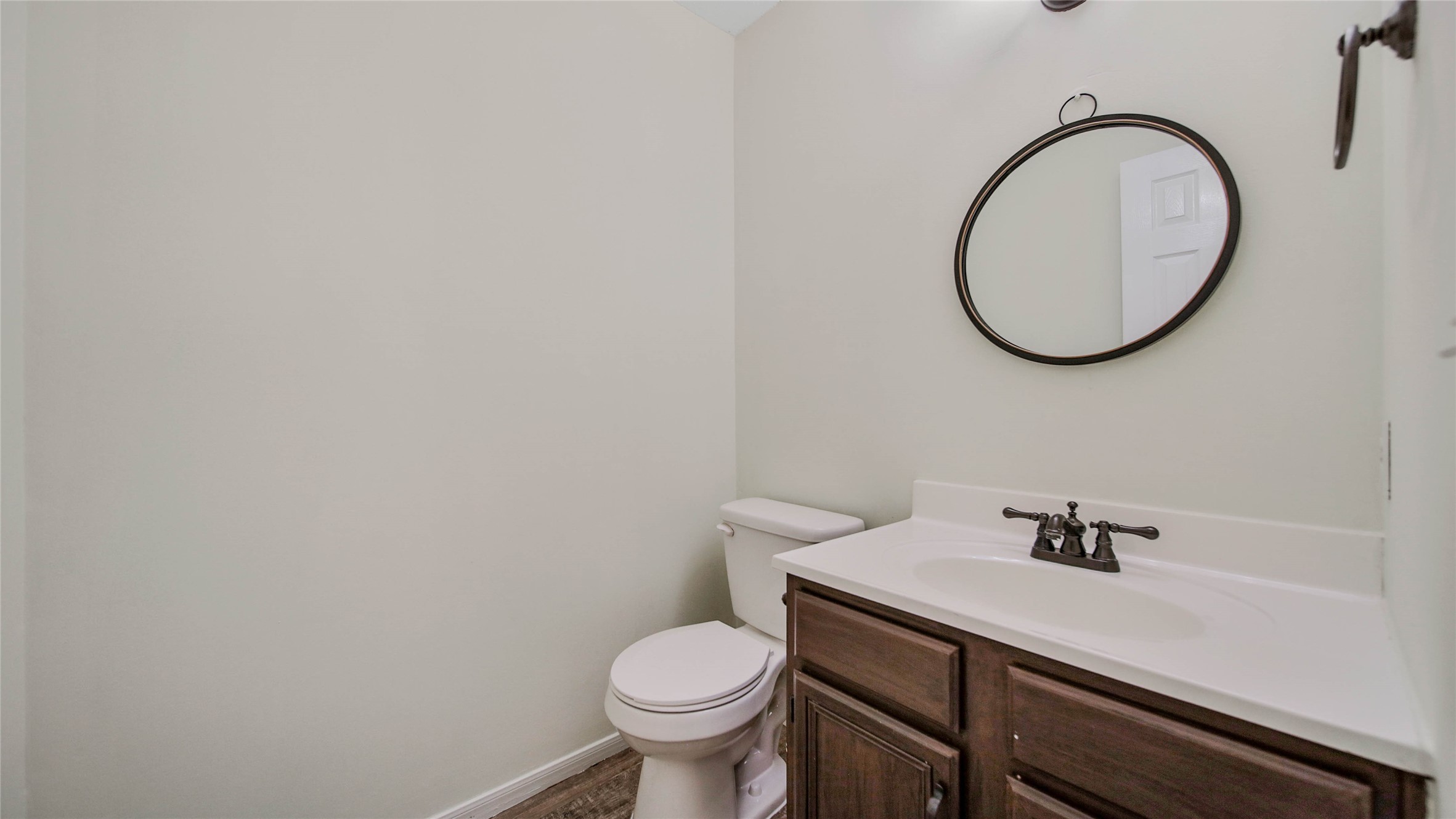 8826 Sunny Point Drive Spring, TX 77379 - Photo 16 of 16 a bathroom with a sink and a mirror