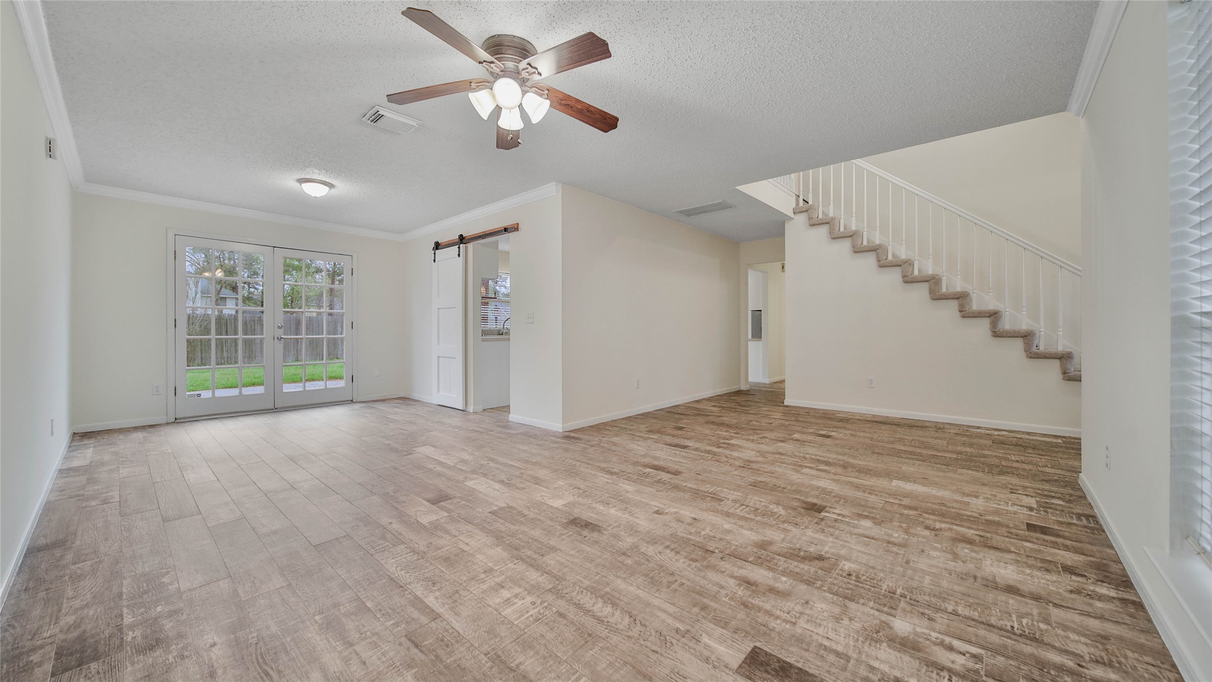 8826 Sunny Point Drive Spring, TX 77379 - Photo 10 of 16 a view of an empty room with a window