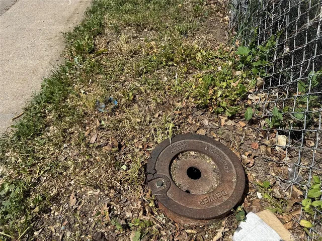 a view of a house with a iron gate