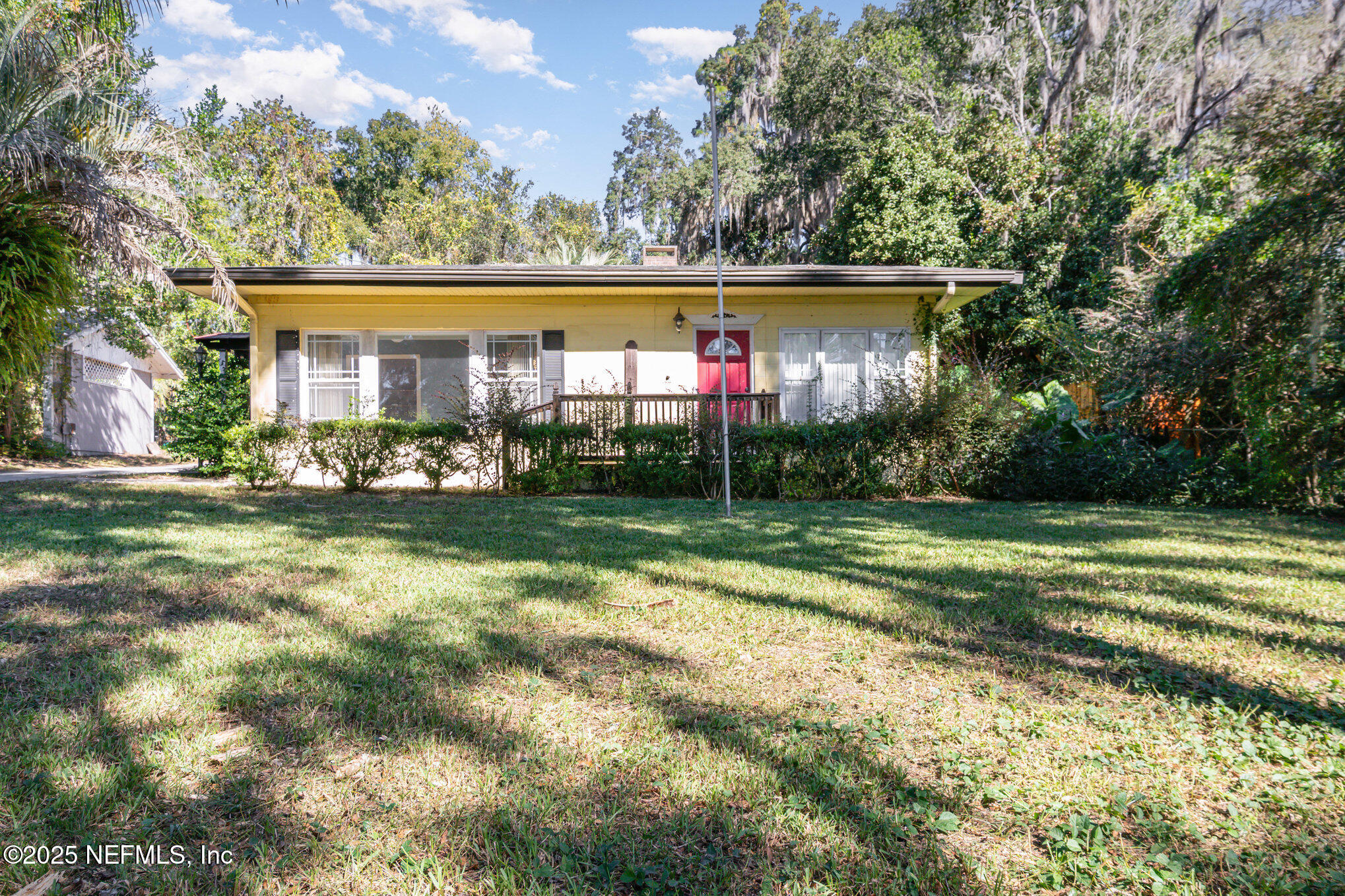 7838 State Road 21 Keystone Heights, FL 32656 - Photo 1 of 22 a view of a house with yard and a garden