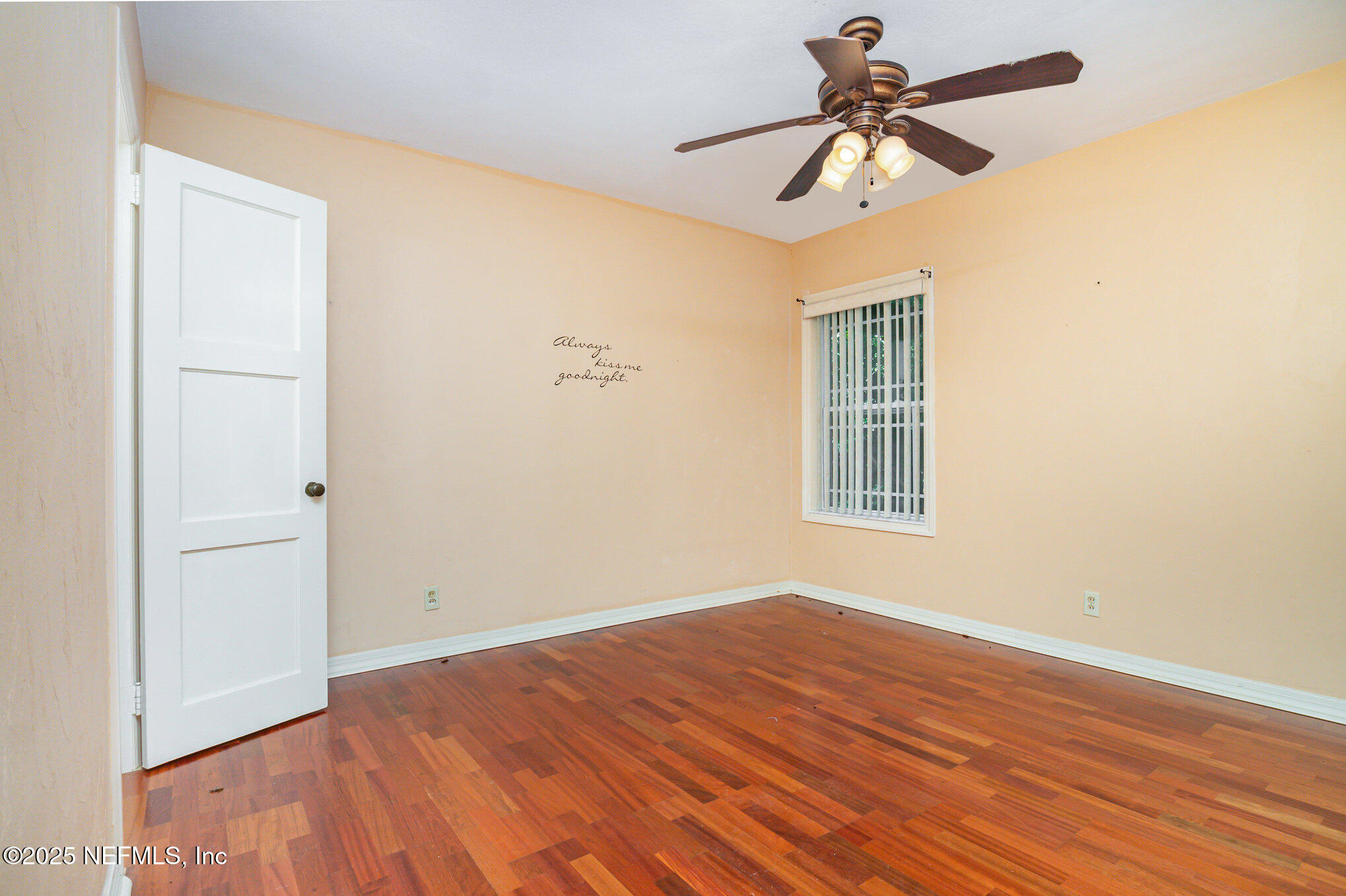 7838 State Road 21 Keystone Heights, FL 32656 - Photo 17 of 22 a view of a room with wooden floor and a ceiling fan